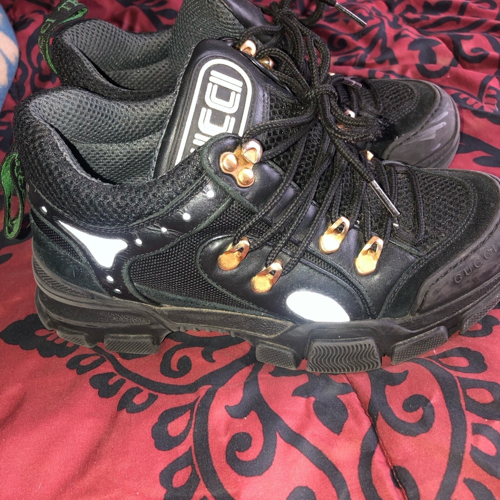 Gucci Black Sneakers with Gold Accents